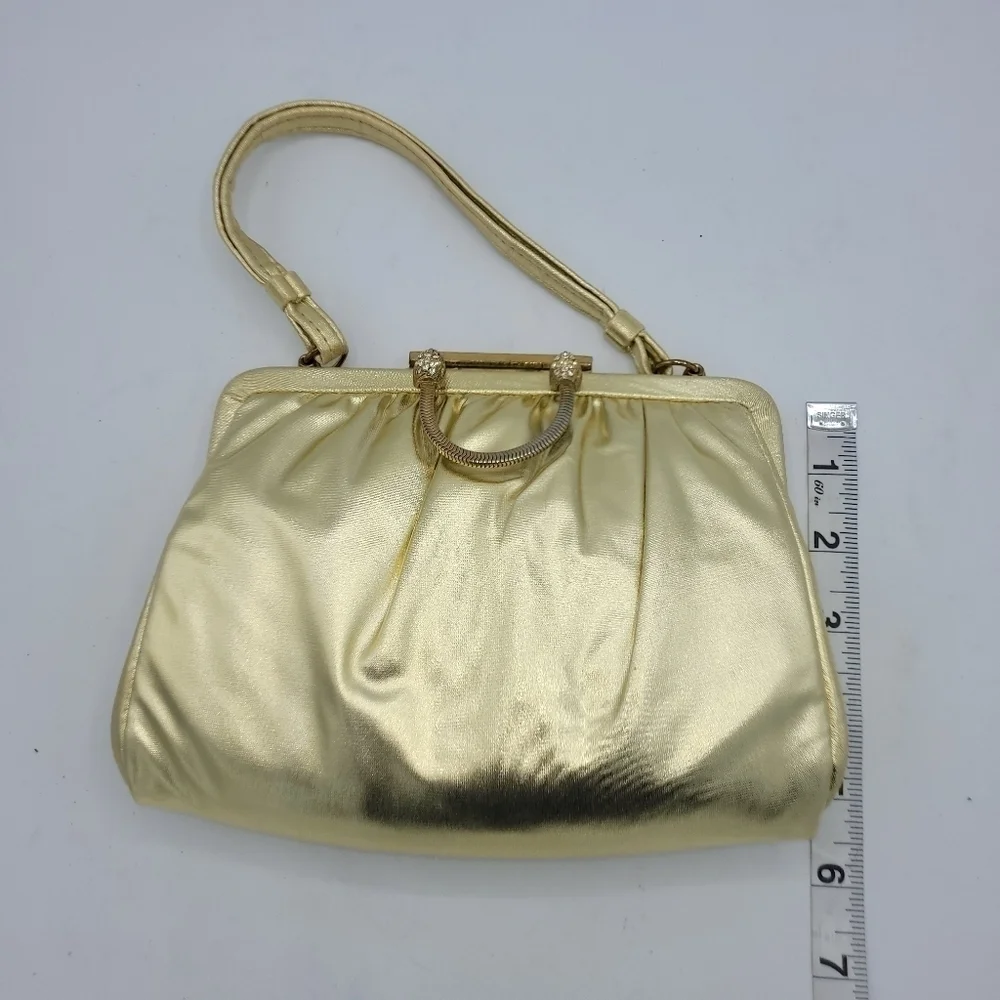 Vintage Andé Gold Clutch With Rhinestone Details Clasp.